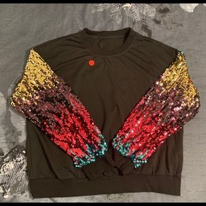 Top with sequin sleeves. Super cute.